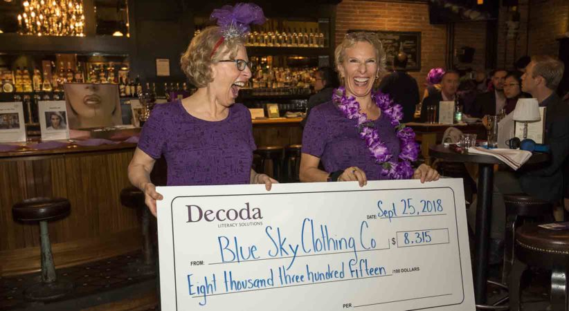 Margaret Sutherland and Marilyn Cobban holding a cheque.